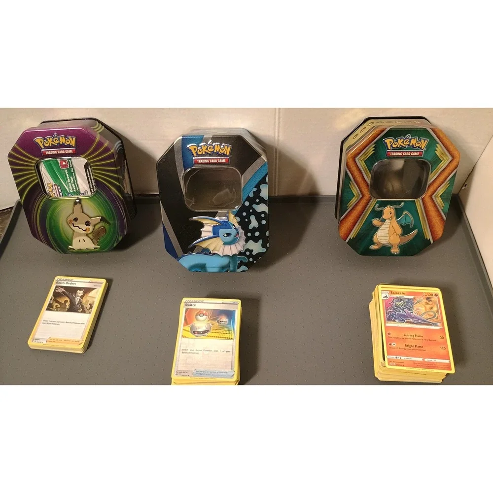 Pokemon TCG Tins Lot 3 Mimikyu Vaporeon Dragonite Assortment  of Trading Cards